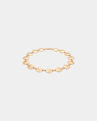 Pulsera de moneda martillada