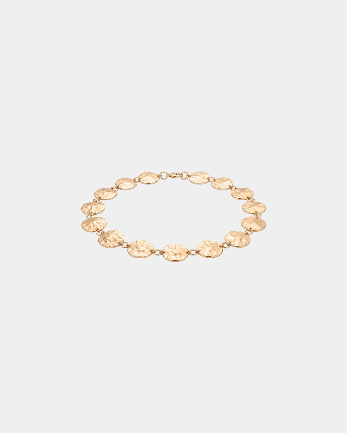 Armband aus gehämmerten Münzen