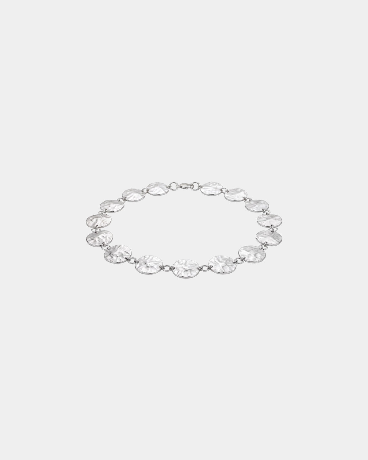 Pulsera de moneda martillada