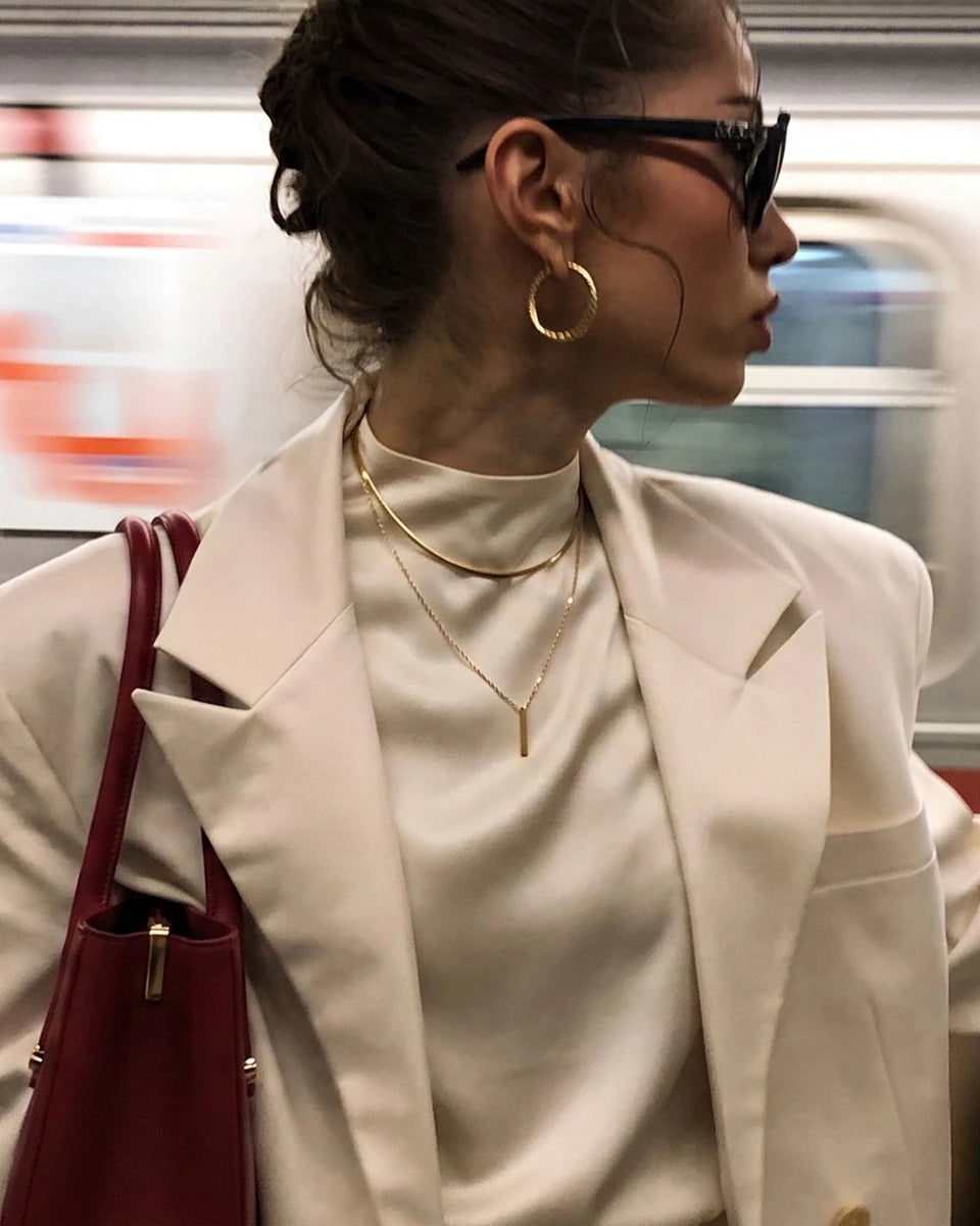 How to Layer Necklaces Without Overdoing It